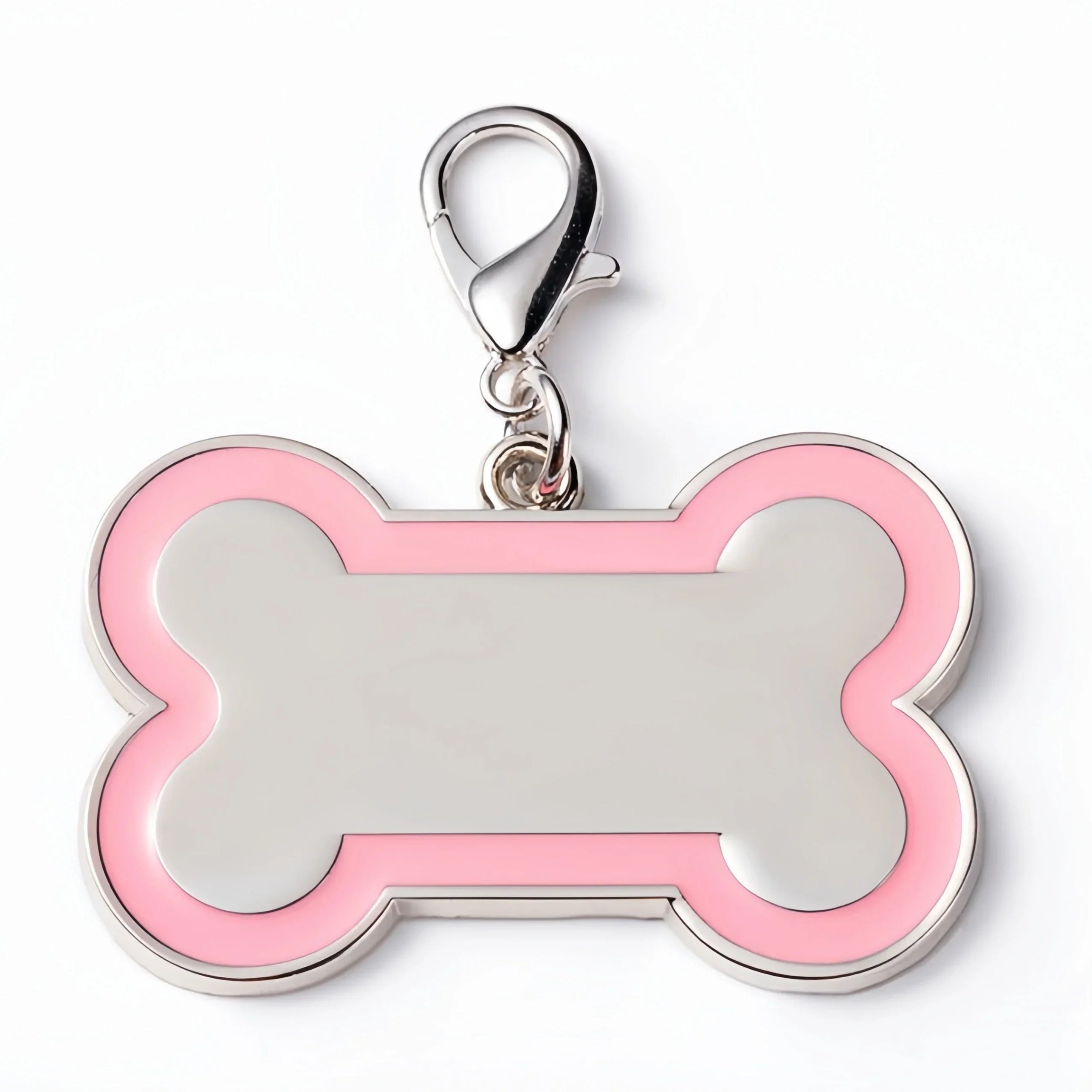 Pink bone-shaped pet tag with a silver clasp on a white background