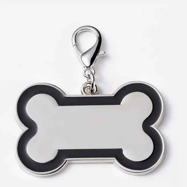 Bone-shaped pet tag with a silver border on a white background
