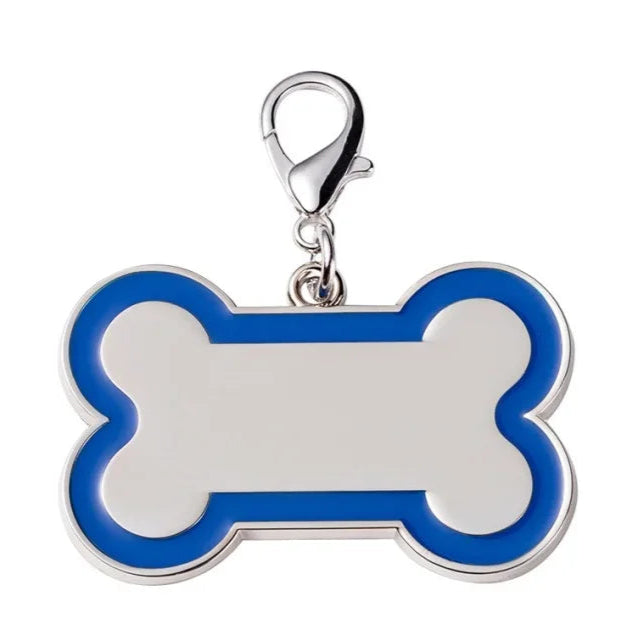 Bone-shaped pet tag with blue border and silver clasp on a white background