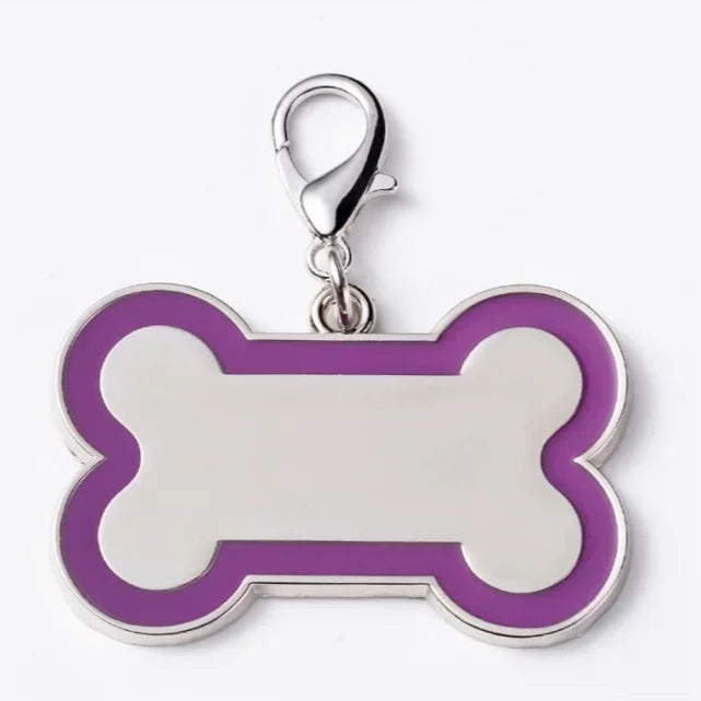 Purple bone-shaped pet tag with a silver clasp on a white background